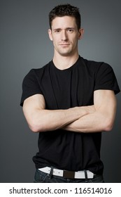 Young Handsome Tall Guy Posing In Black T-shirt.