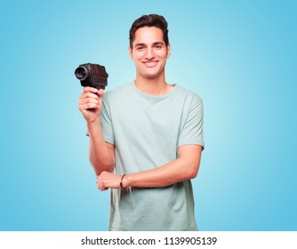 Young Handsome Tanned Man With A Vintage Cinema Camera