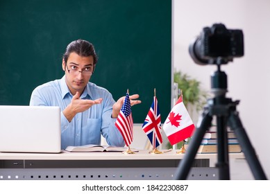 Young Handsome Teacher Recording Video For His Blog