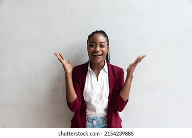 Young Happy African American Casual Business Woman Smiling With Hands Up. Teenage Female Youth Culture Freelancer Person Got An Idea With Facial Expression.