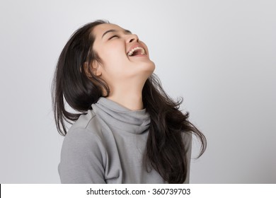 Young Happy Asia Woman Is Laughing.