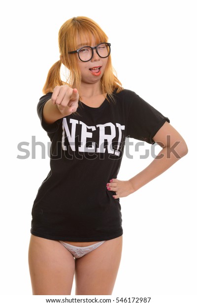 Grinning nerdy girl dances in her underwear