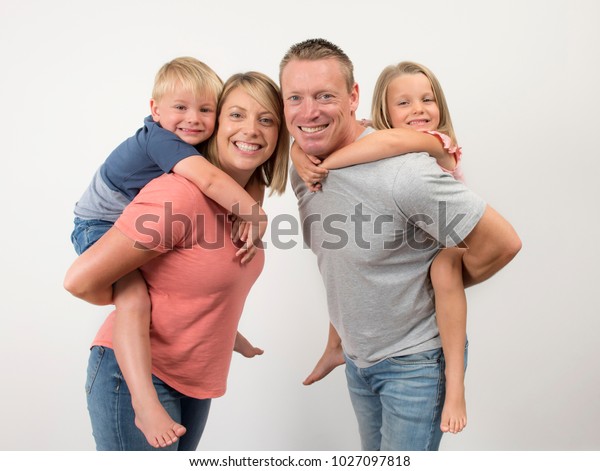 African American Family Of Three Kids Sitting On Fathers Back At Home Stock Photo Download Image Now Istock