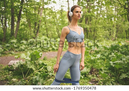 Similar – Slim figure shapely woman in sportswear