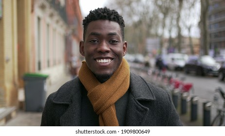 Young Happy Black African Man Walking Outside.