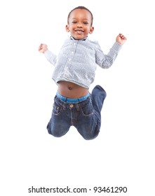 Young Happy Black Boy Isolated Over A White Background Jumping In Joy.