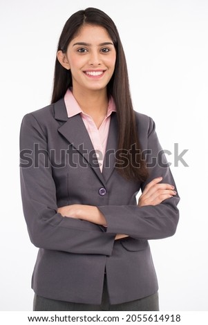 Young and happy businesswoman, isolated on white
