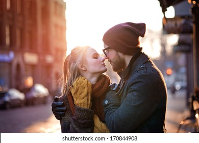 Young Happy Couple Hugging On The City Street