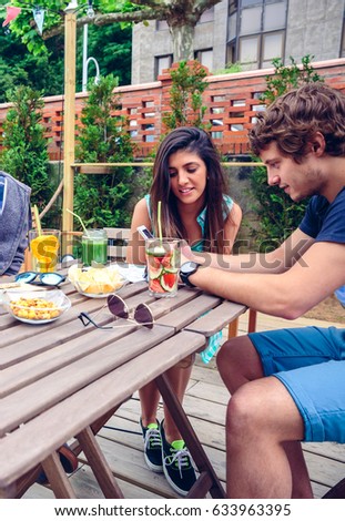 Image, Stock Photo Young happy couple looking smartphone outdoors in summer