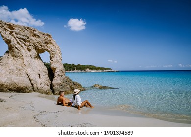 Young Happy Couple On Seashore Crete Greece, Men, And Woman Voulisma Beach Crete Greece. Europe