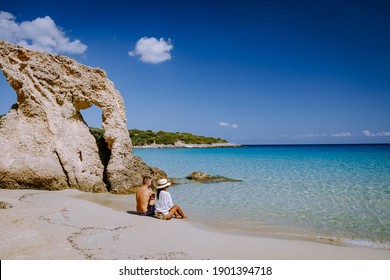 Young Happy Couple On Seashore Crete Greece, Men, And Woman Voulisma Beach Crete Greece. Europe