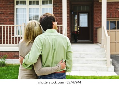 Young Happy Couple Shopping For New Home