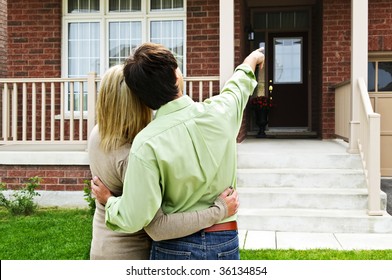 Young Happy Couple Shopping For New Home