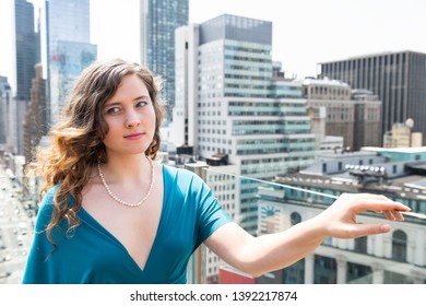 Young Happy Elegant Woman Looking On Rooftop Restaurant In New York City NYC In Green Blue Dress At Wedding Reception With Cityscape Skyscrapers