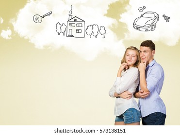 Young Happy Family Couple Dreaming Of Future Wealthy Life