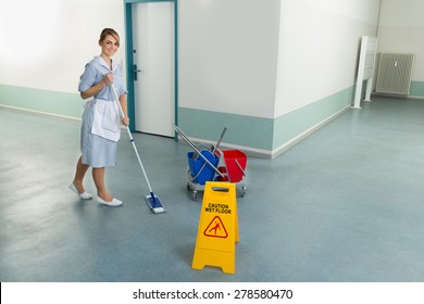 Young Happy Female Janitor Cleaning Floor Stock Photo 278580470 ...