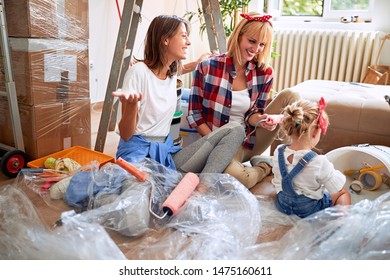 Young Happy Gay Family Moving In New House
