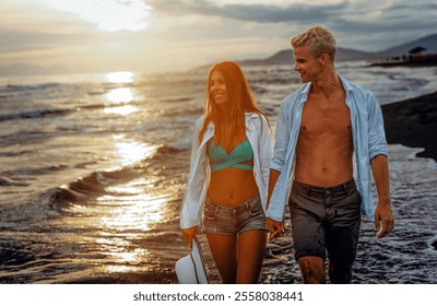 Young happy interracial couple walking on beach smiling, enjoying summer vacation, honeymoon - Powered by Shutterstock