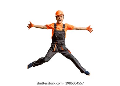 Young happy laughing caucasian man builder construction worker in a safety helmet is jumping on white background isolated. Copy space for your text and logo. Industry concept - Shutterstock ID 1986804557