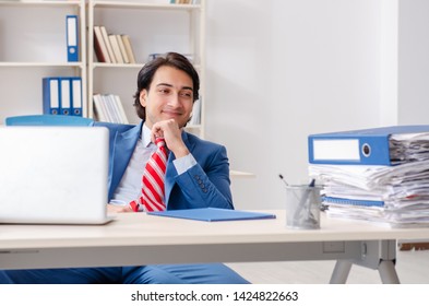 Young Happy Male Employee In The Office 