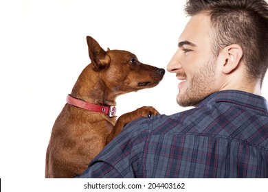 Young Happy Man Holding His Little Dog