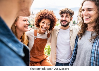 Young Happy People Laughing Together - Multiracial Friends Group Having Fun On City Street - Diverse Culture Students Portrait Celebrating Outside - Friendship, Community, Youth, University Concept.	 