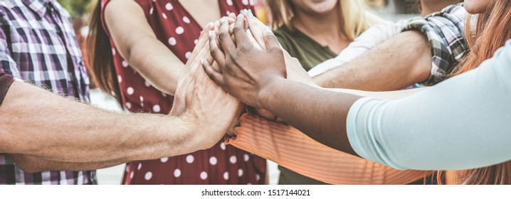 Young Happy People Stacking Hands Outdoor - Diverse Culture Students Celebrating Together - Youth Lifestyle, University, Relationship, Human Resorces, Work And Friendship Concept - Focus On Black Hand