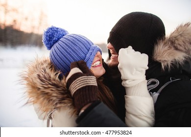 Young  Happy Smiling Couple In Love. Having Fun. Winter