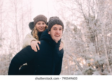 Young Happy Smiling Couple In Love. Having Fun. Winter