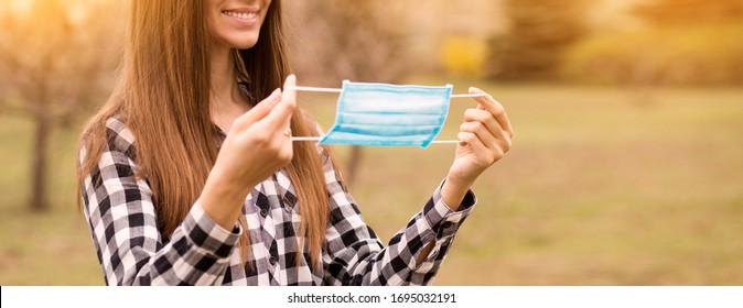 Young Happy Smilling Woman Wearing Face Protective Mask Outdoor In City