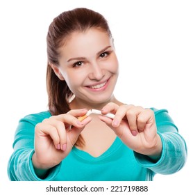 Young Happy Woman With Broken Cigarette. Stop Smoking Concept.