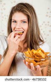 Young Happy Woman Eating Chips