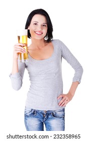 Young happy woman holding a glass of beer.