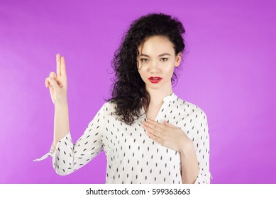 
Young Happy Woman Making A Promise .