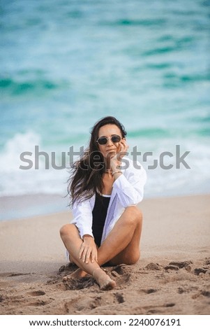 Similar – Image, Stock Photo Thoughtful latin woman on the beach