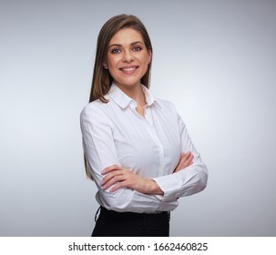 Young Happy Woman Posing With Crossed Arms. Isolated Female Portrait.