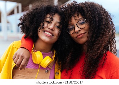 young happy women having fun outdoor , laughing and sharing good mood. Teenagers friends spending time outdoor in Barcelona - Powered by Shutterstock