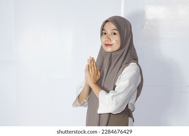 young hijab women gesturing ied mubarak greeting - Shutterstock ID 2284676429