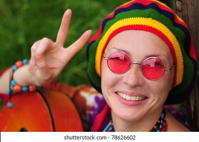 Young Hippie Woman Making Peace Sign