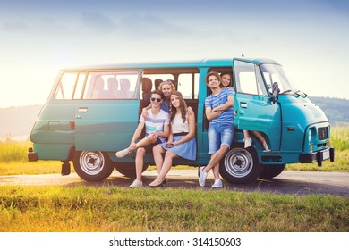 Young hipster friends on road trip on a summer day - Powered by Shutterstock