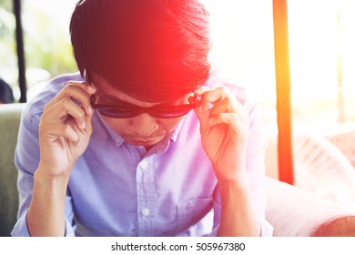 Young Hipster Man In Coffee Shop