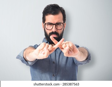 Young Hipster Man Doing NO Gesture