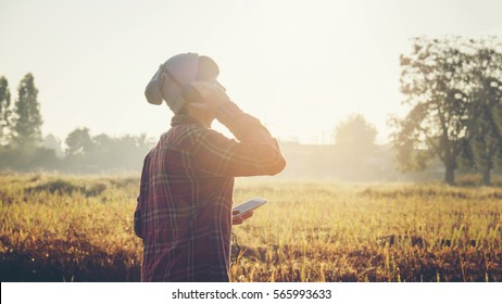 young hipster Man listening to music, mobile phone, headphones, enjoying on time - Shutterstock ID 565993633