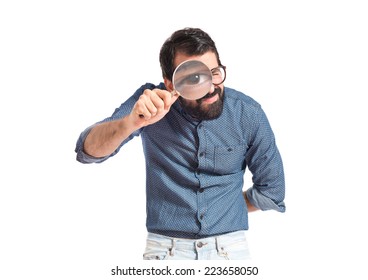 Young Hipster Man With Magnifying Glass