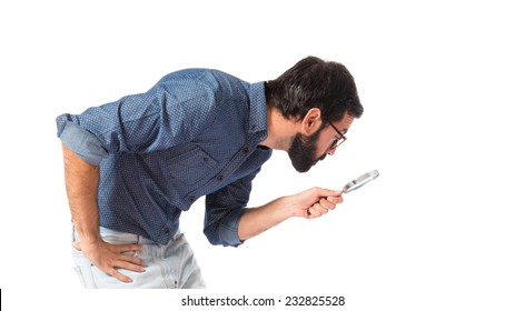 Young Hipster Man With Magnifying Glass