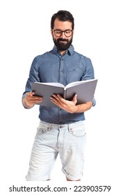 Young Hipster Man Reading A Book