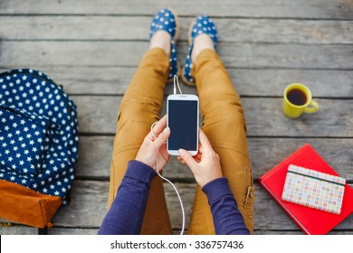Young Hipster Woman Using Smart Phone Outdoor