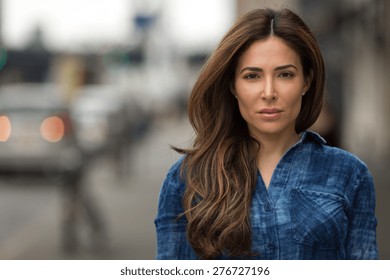 Young Hispanic Caucasian Woman Serious Face Portrait