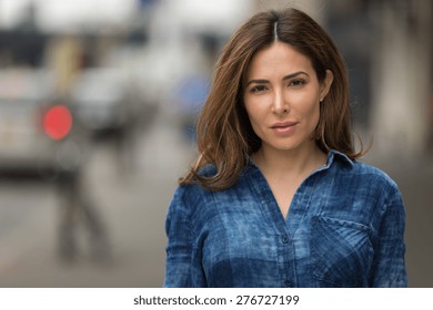 Young Hispanic Caucasian Woman Serious Face Portrait