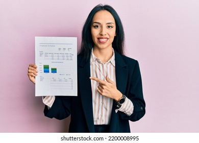 Young Hispanic Girl Wearing Business Jacket Holding Document Smiling With A Happy And Cool Smile On Face. Showing Teeth. 